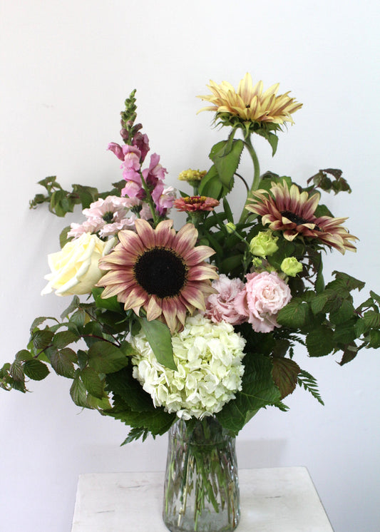 Bouquet de fleurs au choix du fleuriste dans un vase