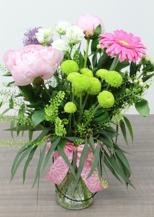 Bouquet de fleurs au choix du fleuriste dans un vase