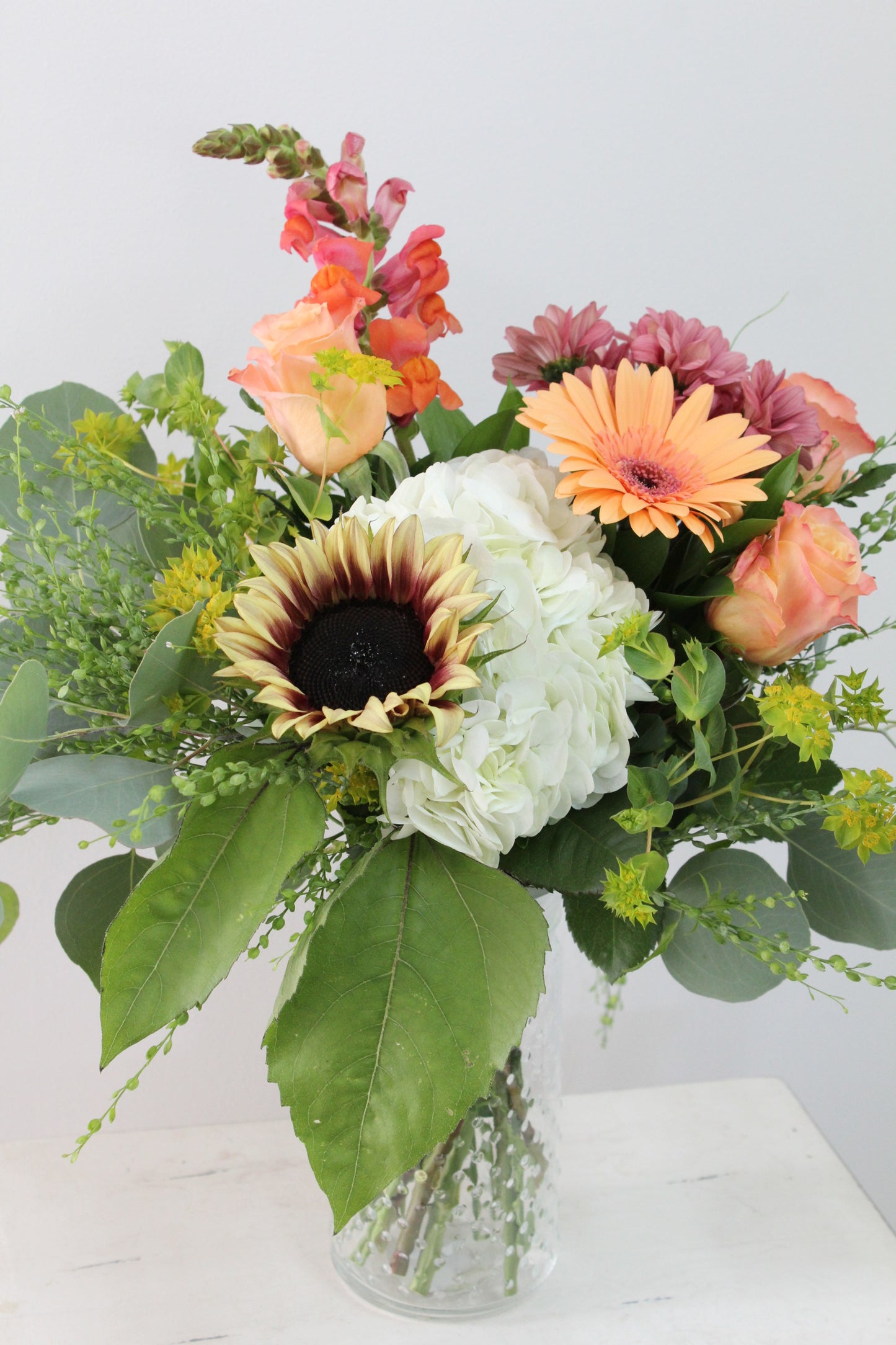 Bouquet de fleurs au choix du fleuriste dans un vase