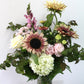 Bouquet de fleurs au choix du fleuriste dans un vase